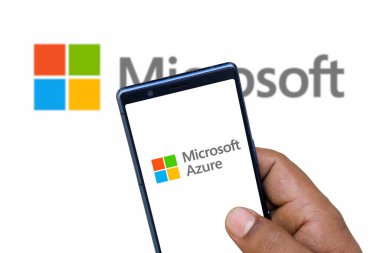 Dhaka, Bangladesh 12 Jan 2025: Smart phone with the Microsoft Azure logo, is a cloud service offered as a service and hosted in Microsoft Data Centers. clipart