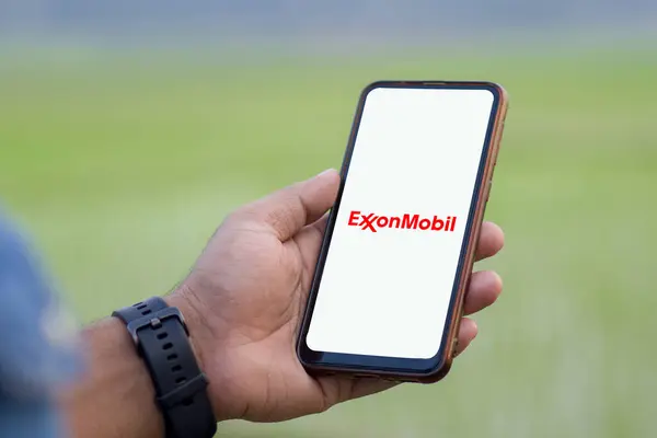 stock image ExxonMobil Corporation Logo on a mobile screen stock image. It's a major multinational publicly traded oil and gas company: Dhaka, Bangladesh-06 September 2024.