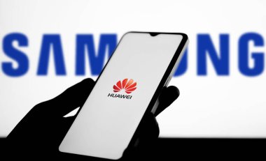 Dhaka,Bangladesh 15 September 2024:Comparison of Samsung and Huawei logo on smartphone. clipart