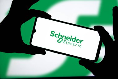Dhaka, Bangladeş 23 Eylül 2024: Schneider Elektrik şirketi logosu cep telefonunda sergilendi.