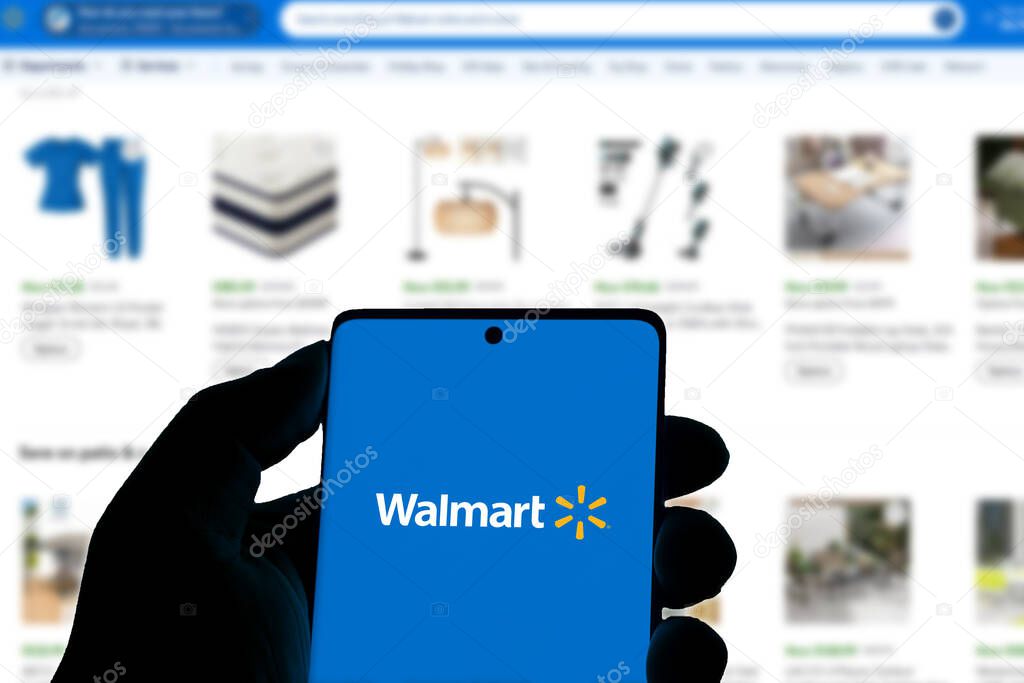 Dhaka,Bangladesh 03 Nov 2024:Walmart Plus logo displayed on smartphone screen with Walmart logo in the background.