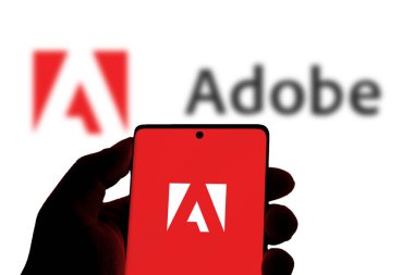 Dhaka,Bangladesh 11 Nov 2024:Adobe logo on phone screen stock image. clipart