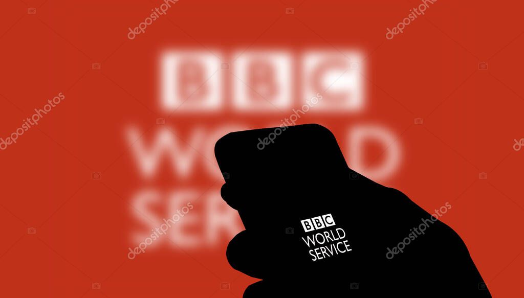 Dhaka,Bangladesh 13 Nov 2024:BBC News logo on smartphone screen with breaking news background.
