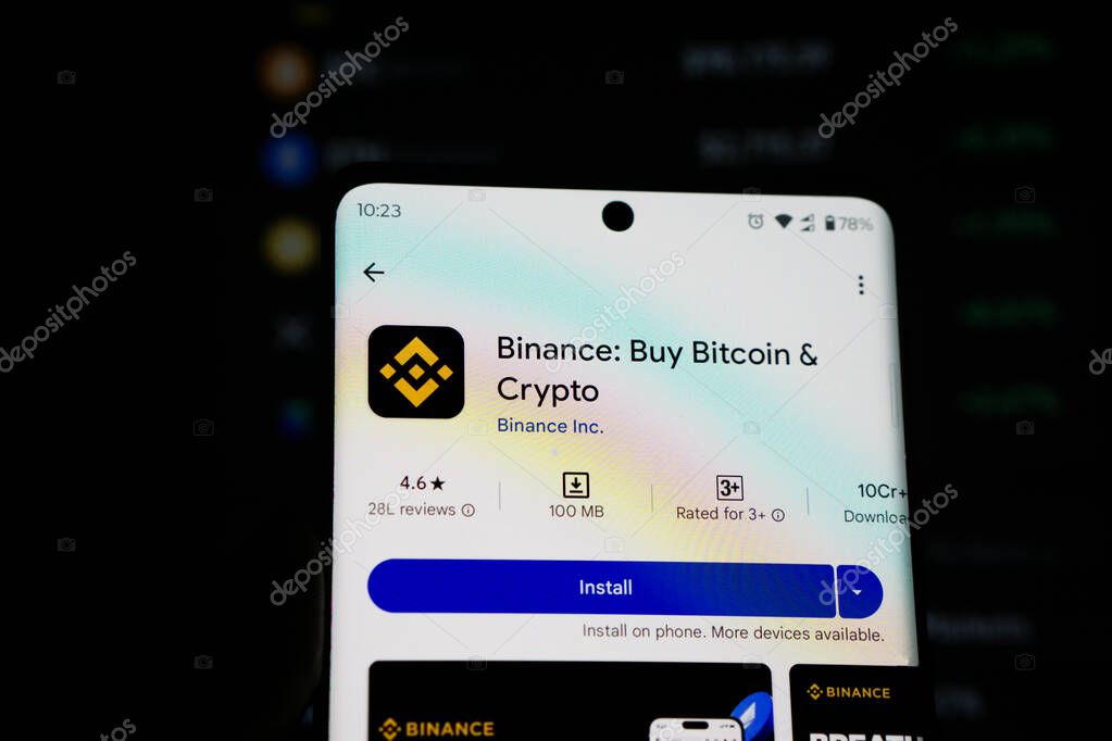 Dhaka,Bangladesh 05 March 2025: Smartphone on surface showing Binance in playstor. Binance is a cryptocurrency exchange focusing primarily on the Asian and Anglo-Saxon markets.