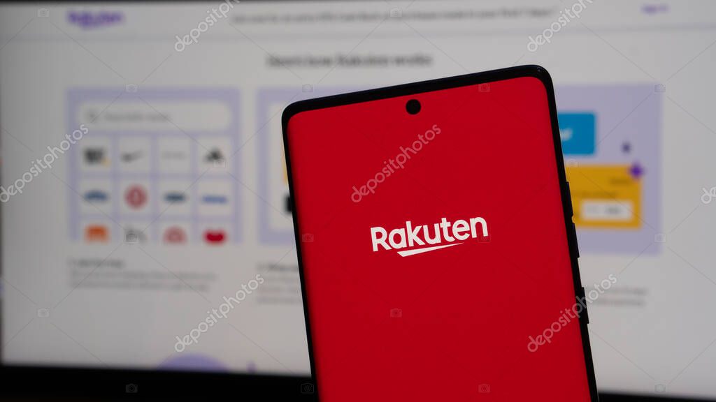 Dhaka, Bangladesh 19 April 2025: Rakuten Group is Japanese electronic commerce and online retailing company. Shopping cart with parcels on the background of the Rakuten logo.