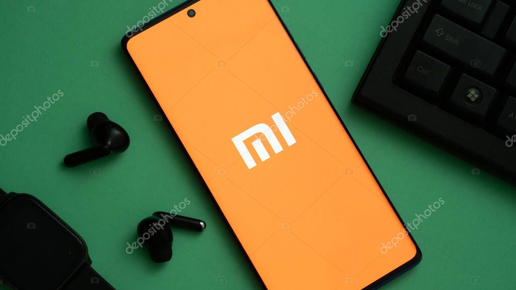 Dhaka, Bangladesh 04 May 2025: Xiaomi MI logo on xiaomi modern smartphone screen.