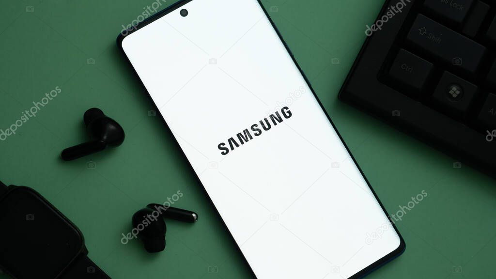 Dhaka, Bangladesh 03 May 2025: Smartphone on surface showing Samsung logo.