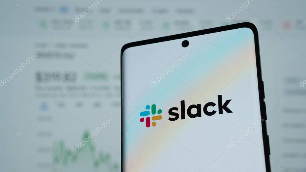 Dhaka, Bangladesh 03 May 2025: Mobile phone with logo of American software company Slack Technologies LLC on screen in front of website.