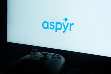 Dhaka, Bangladesh 01 June 2025:Aspyr logo on a white screen with a gaming controller visible.