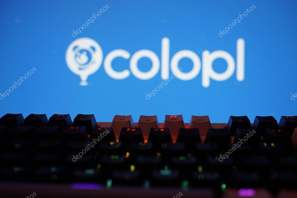 Dhaka, Bangladesh 02 June 2025:Colopl logo in white on blue above a colorful, blurred keyboard.