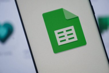Dhaka, Bangladesh 23 August 2025: Google Sheets icon in green displayed on a smartphone