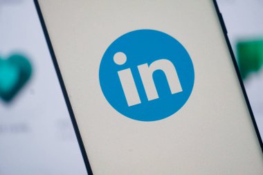Dhaka, Bangladesh 23 August 2025: LinkedIn logo depicted in blue on a smartphone screen
