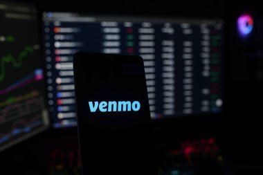 Dhaka, Bangladesh 22 September 2025:A Bitcoin and Venmo logo on a blue screen representing cryptocurrency