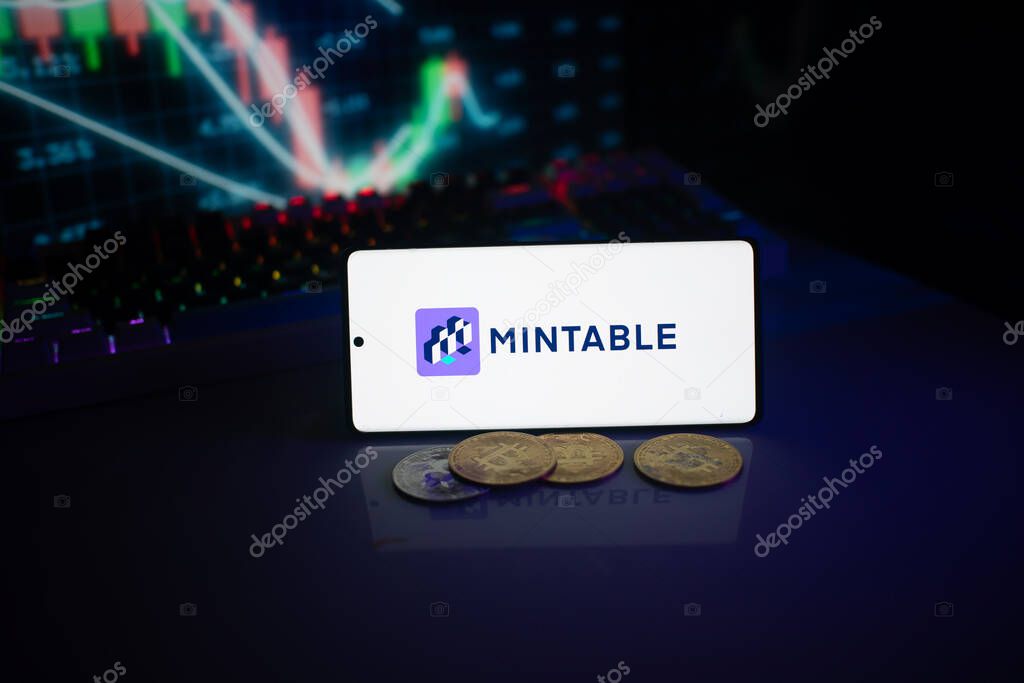 Dhaka, Bangladesh 18 September 2025:Mintable app shown on smartphone screen with coins and stock graph backdrop