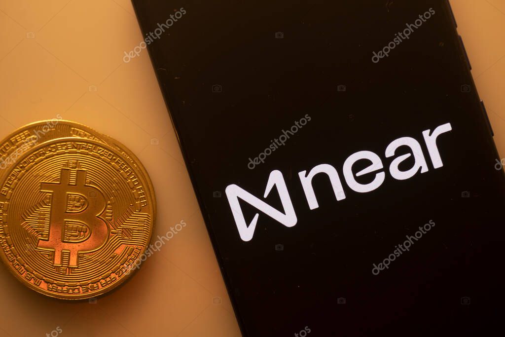 Dhaka, Bangladesh 18 September 2025:Near app on smartphone screen with coins and stock graph displayed behind