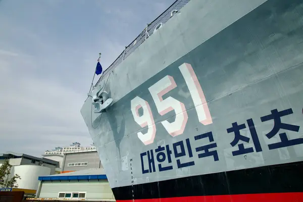 stock image Ulsan, South Korea - March 17th, 2024: The hull of the Ulsan Frigate, marked with the number 951 and the inscription 