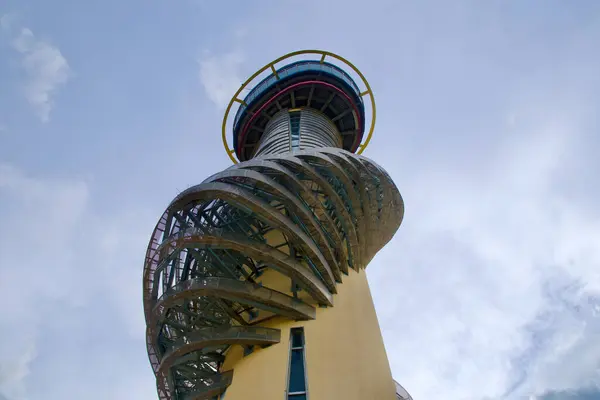 Stock image Sokcho, South Korea - July 28th, 2024: A dramatic upward perspective of the Sokcho Expo Tower, emphasizing its intricate spiral design as it reaches into the sky, a modern architectural marvel in Sokcho.