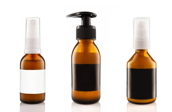 Dark Cosmetic Amber Glass Bottles Set Black Blank Labels Cosmetics — Stock Photo, Image