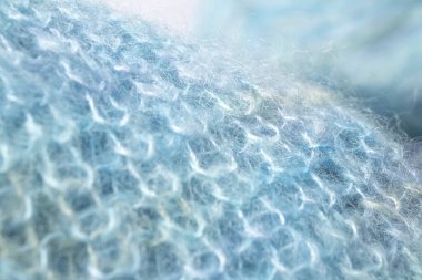 El yapımı örgü, modaya uygun bir konsept. Örgü örülmüş battaniye, merino yün arka plan