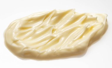 Beyaz arka planda sarı yüz veya vücut kozmetik kremi izleri.