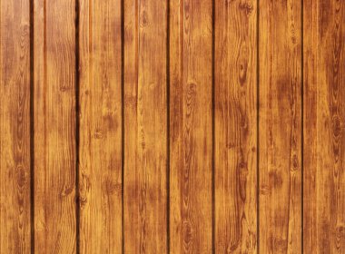 Parlak ahşap bir çitin dokusu. Çitin yapısı tahtadan yapılmış.