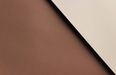 Kahverengi ve bej kağıttan kopyalama alanı olan soyut geometrik arkaplan.