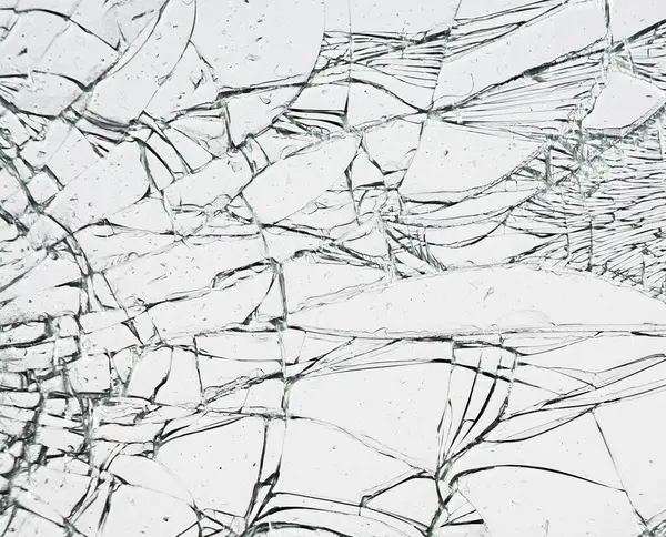 stock image Glass with cracks. Broken window texture on white background.