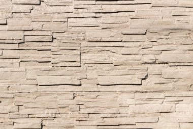 Taş duvar arkaplanının yüksek kaliteli dokusu.