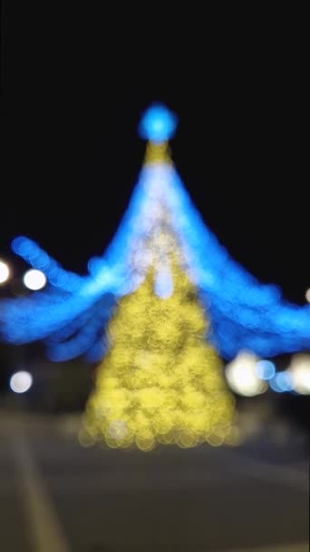 Bokeh Φώτα Λάμπει Στο Χριστουγεννιάτικο Δέντρο Defocused Φόντο Χειμερινές Διακοπές — Αρχείο Βίντεο