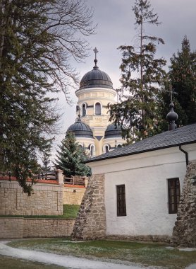 Capriana Monastery outdoors winter view. Traditional Christian Orthodox church located in Republic of Moldova. Eastern Europe basilica traditional architecture style
