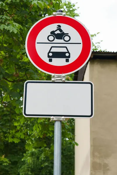 Road sign. Urban traffic. motorbikes and cars prohibited. German road signs