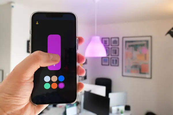 Smart home. Remote control of the light with a smartphone. Setting the color of the lights. Internet of things.