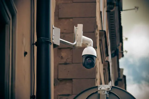 City monitoring. The camera is placed in the historic city center on a tenement house.