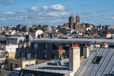 Granville in Normandy, France, with its houses and view over the rooftops clipart