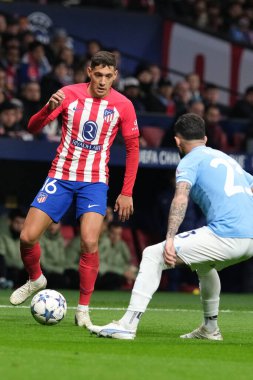 Madrid 'deki UEFA Şampiyonlar Ligi sırasında Atletico de Madrid' den Nahuel Molina ve 13 Aralık 2023 'te Madrid, İspanya' daki SS Lazio Mertropolitano Stadyumu. 