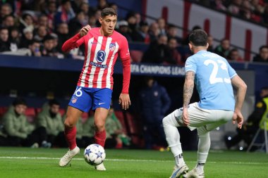 Madrid 'deki UEFA Şampiyonlar Ligi sırasında Atletico de Madrid' den Nahuel Molina ve 13 Aralık 2023 'te Madrid, İspanya' daki SS Lazio Mertropolitano Stadyumu. 