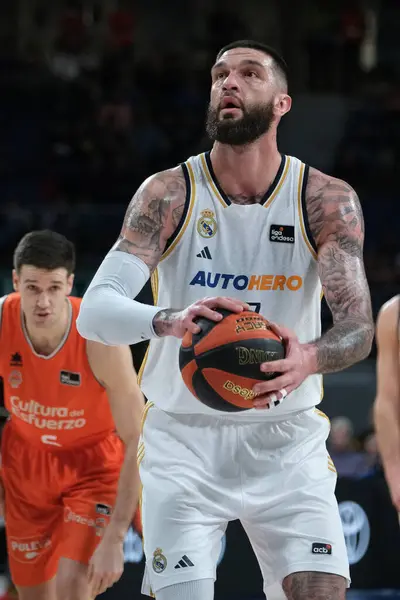 stock image Vincent Poirier  of Real Madrid during ACB League match between Real Madrid and Valencia st WiZink Center on december 31, 2023 in Madrid, Spain.