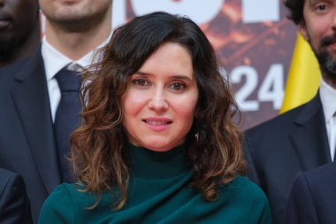 Madrid Topluluğu başkanı Isabel Diaz Ayuso, Real Madrid takımı, yönetim ve antrenörlük kadrosunu almadan önce 19 Şubat 2024 tarihinde Madrid, İspanya 'da Real Casa de Correos' ta.
