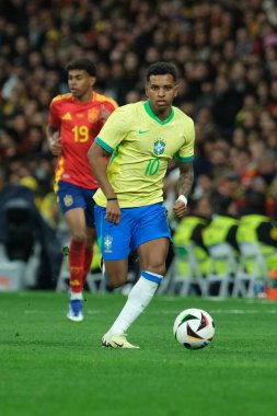 Raphinha  of Brazil during the friendly match between Spain and Brazil at Santiago Bernabeu Stadium in Madrid on March 26  Spain clipart