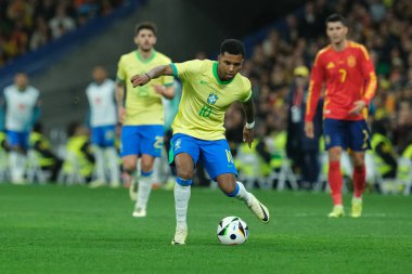 Raphinha  of Brazil during the friendly match between Spain and Brazil at Santiago Bernabeu Stadium in Madrid on March 26  Spain clipart