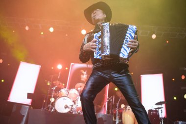 Musical group Los Tigres Del Norte perform during concert at the WizCenter in Madrid, April 4, 2024, Spain clipart