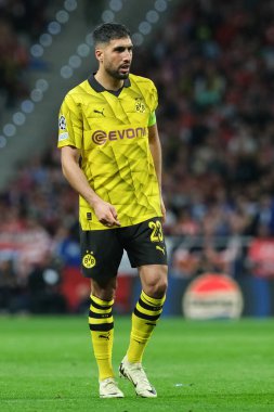 Emre Can  of Borussia Dortmund during the UEFA Champions League,  between At Madrid and Borussia Dortmund in Metropolitano Stadium on April 10, 2024 in Madrid Spain.  clipart