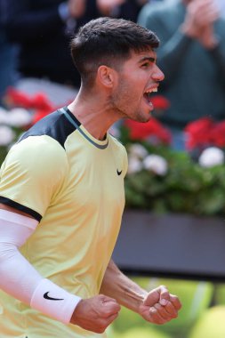 Carlos Alcaraz of Spain  against Alexander Shevchenko  during their second round match on day four of the Mutua Madrid Open at La Caja Magica on April 26, 2024 in Madrid, Spain. clipart