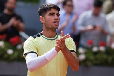 Carlos Alcaraz of Spain  against Alexander Shevchenko  during their second round match on day four of the Mutua Madrid Open at La Caja Magica on April 26, 2024 in Madrid, Spain. clipart