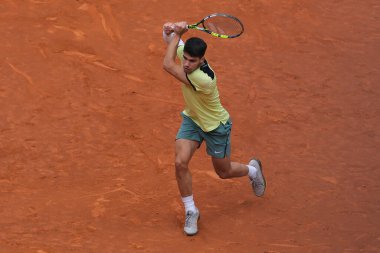 Carlos Alcaraz of Spain  against Thiago Seyboth  in the Men's Singles Round of 32 Match during Day Six of the Mutua Madrid Open at La Caja Magica on April 28, 2024 in Madrid, Spain.  clipart