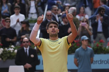 Carlos Alcaraz of Spain  against Thiago Seyboth  in the Men's Singles Round of 32 Match during Day Six of the Mutua Madrid Open at La Caja Magica on April 28, 2024 in Madrid, Spain.  clipart