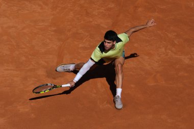 Carlos Alcaraz of Spain against  Struff  during their Men's Round of 16 match on day eight of the Mutua Madrid Open at La Caja Magica on April 30, 2024 in Madrid, Spain.  clipart