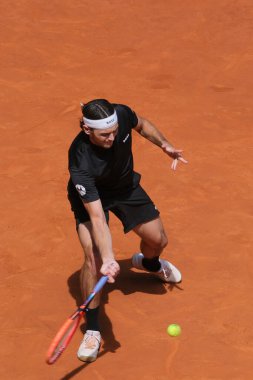 Taylor Fritz of USA against Andrey Rublev during the Men's Singles semi-final match on Day Eleven of Mutua Madrid Open at La Caja Magica on May 03, 2024 in Madrid, Spain. clipart