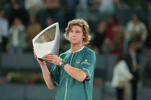 stock image Andrey Rublev poses with the Mutua Madrid Open trophy following victory in the Men's Singles Final match against Felix Auger  of Mutua Madrid Open at La Caja Magica on May 05, 2024 in Madrid, Spain. 