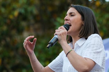 The candidate of Podemos for the European elections, Irene Montero,  during the beginning of the electoral campaign of Podemos, in the Arturo Barea square, on 23 May, 2024 in Madrid, Spain. clipart